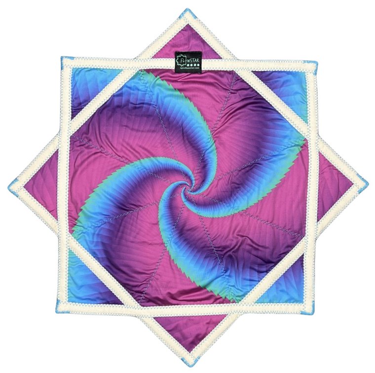 The Flow Star prize, an eight point fabric star in magenta and cyan with a cream bound edge